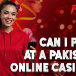 A smiling woman wearing a red hoodie is holding a smartphone and giving a thumbs-up gesture. The background is vibrant with red and orange colors, featuring casino-related elements like poker chips and lottery balls. The bold text reads: "CAN I PLAY AT A PAKISTAN ONLINE CASINO?", and a logo in the corner says "PAK Games.