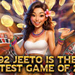 A vibrant illustration of a cheerful woman with long wavy hair, wearing a white crop top and colorful accessories, standing between two roulette wheels with golden coins flying around. Bold golden text reads, “92 Jeeto is the Hottest Game of 2025.”