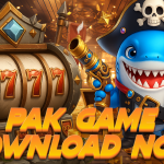 A colorful promotional image featuring a smiling pirate shark holding a toy gun next to a golden slot machine showing triple 7s, with the bold text “PAK GAME DOWNLOAD NOW” at the bottom.